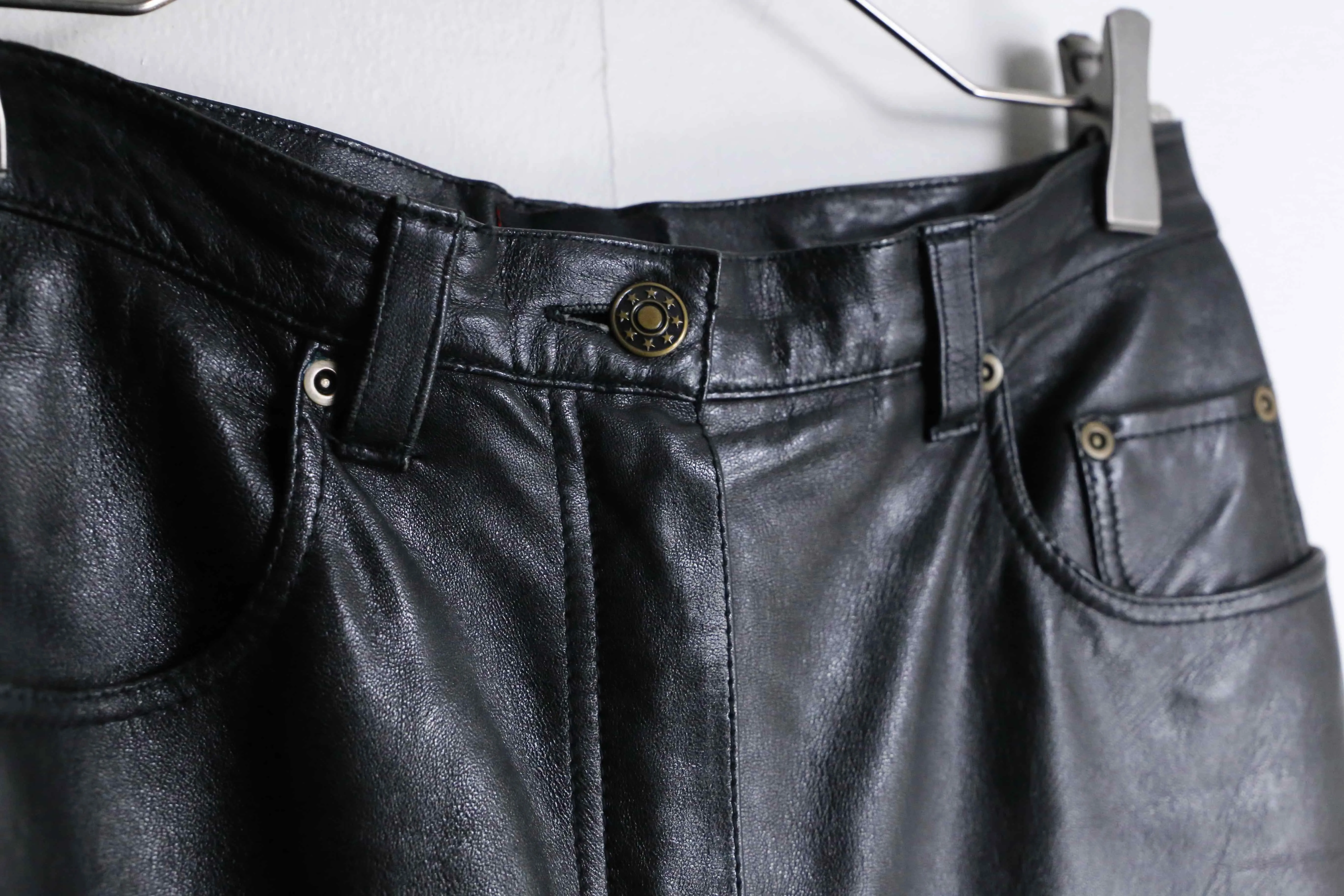 black color straight silhouette leather pants